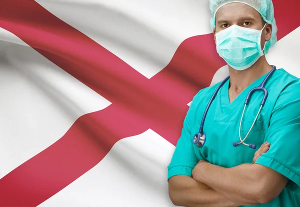 Surgeon with US states flags on background series - Alabama — Stock Photo, Image