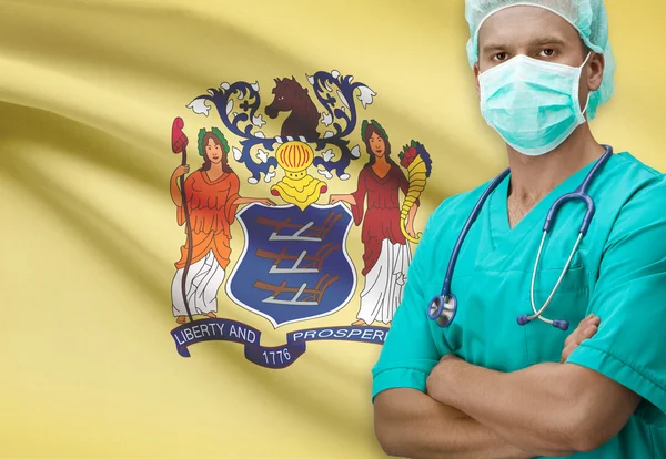 Chirurgien avec nous indique les drapeaux sur la série de fond - New Jersey — Photo