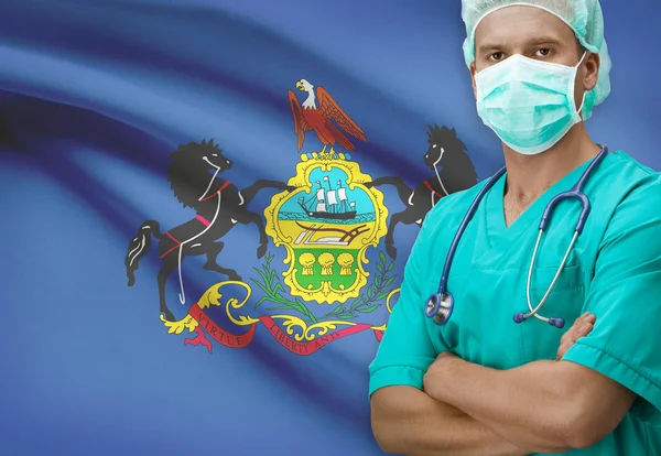 Surgeon with US states flags on background series - Pennsylvania — Stock Photo, Image