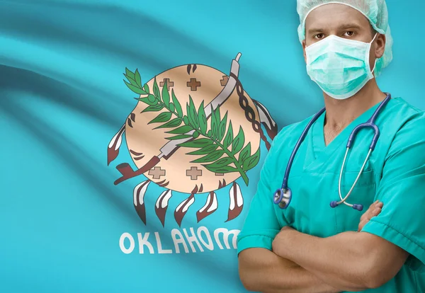 Surgeon with US states flags on background series - Oklahoma — Stock Photo, Image