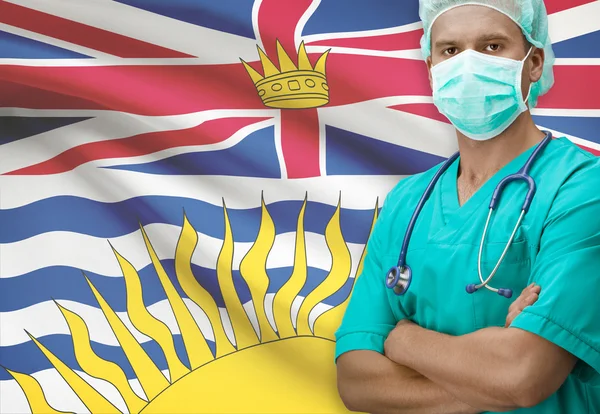 Surgeon with Canadian province flag on background series - British Columbia — Stock Photo, Image