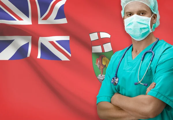 Surgeon with Canadian province flag on background series - Manitoba — Stockfoto