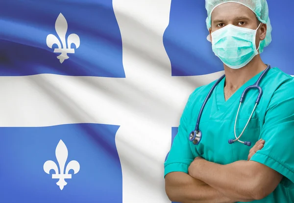 Surgeon with Canadian province flag on background series - Quebec — 图库照片