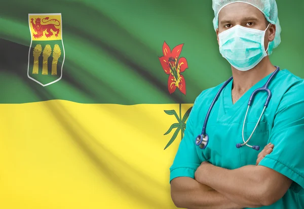 Chirurgien avec le drapeau de la province canadienne sur les séries de fond - Saskatchewan — Photo