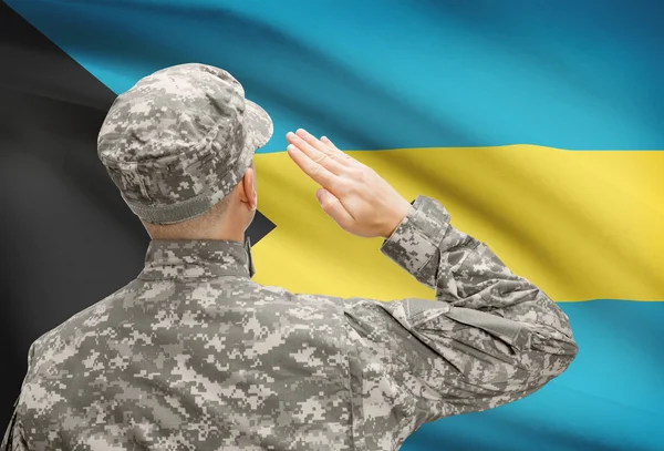 Soldado en sombrero ante serie de bandera nacional - Bahamas —  Fotos de Stock