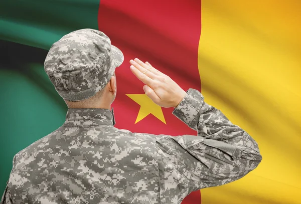 Soldier in hat facing national flag series - Cameroon — Stock Photo, Image