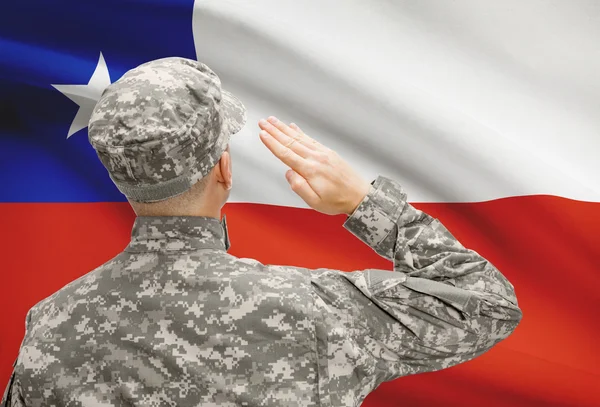 Soldier in hat facing national flag series - Chile — Stock Photo, Image