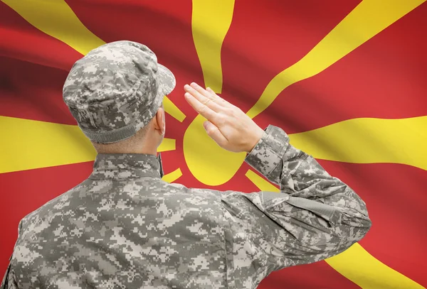 Soldier in hat facing national flag series - Macedonia — Stock Photo, Image
