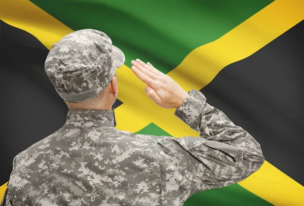 Солдат в капелюсі, облицювання Національний прапор серії - Ямайка — стокове фото