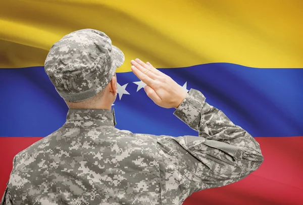 Soldier in hat facing national flag series - Venezuela — Stock Photo, Image