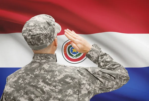 Soldier in hat facing national flag series - Paraguay — Stock Photo, Image