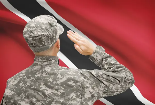 Soldier in hat facing national flag series - Trinidad and Tobago — Stock Photo, Image