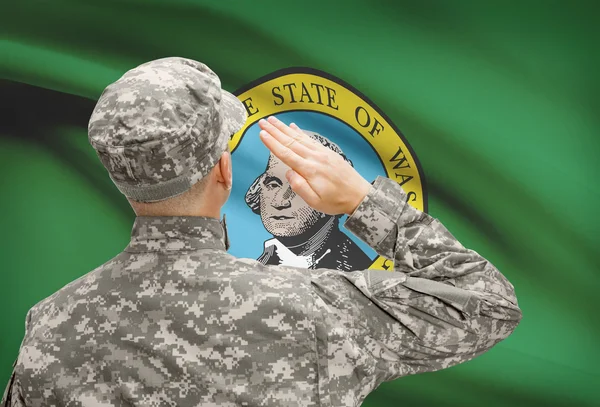 Soldier saluting to US state flag series - Washington — Stock Photo, Image