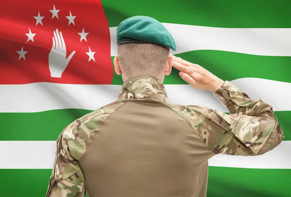National military forces with flag on background conceptual series - Abkhazia — Stock Photo, Image