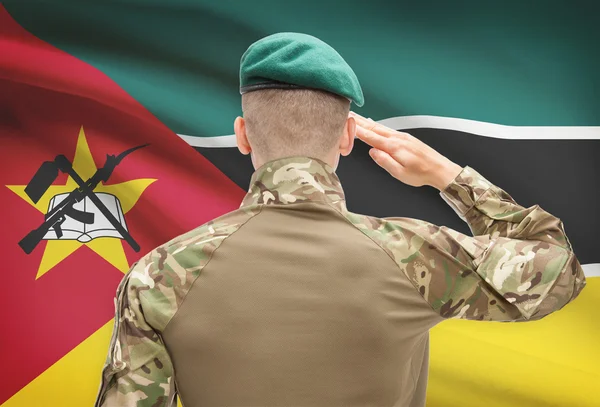 Národní vojenské síly s vlajkou na pozadí koncepční řady - Mosambik — Stock fotografie