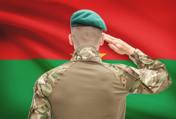 National military forces with flag on background conceptual series - Burkina Faso — Stock Photo, Image