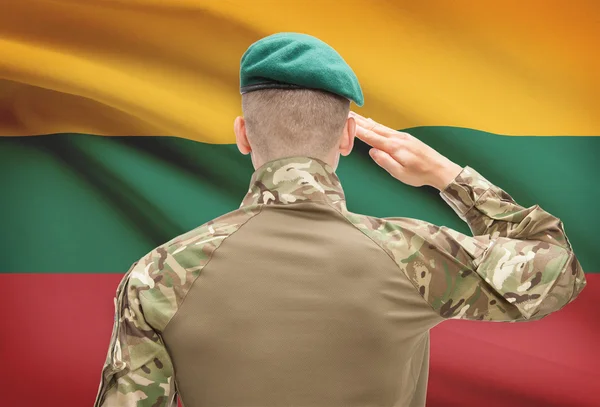 Fuerzas militares con la bandera en la serie conceptual de fondo - Lituania —  Fotos de Stock