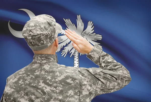 Soldier saluting to US state flag series - South Carolina — Stock Photo, Image