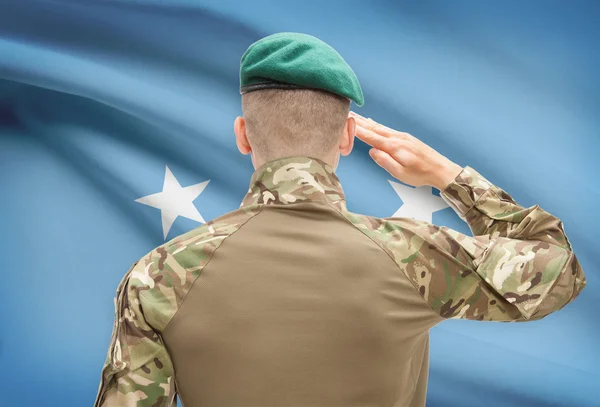 Národní vojenské síly s vlajkou na pozadí koncepční řady - Mikronésie — Stock fotografie