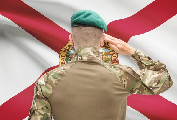 Soldier saluting to USA state flag conceptual series - Florida — Stock Photo, Image