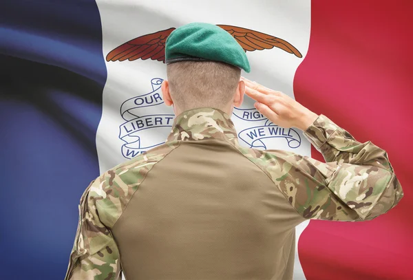 Soldier saluting to USA state flag conceptual series - Iowa — Stock Photo, Image