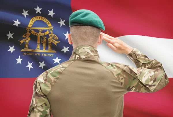Soldier saluting to USA state flag conceptual series - Georgia — Stock Photo, Image