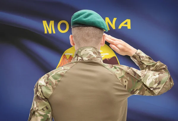 Soldat, saluant d'état des Usa drapeau série conceptuelle - Montana — Photo