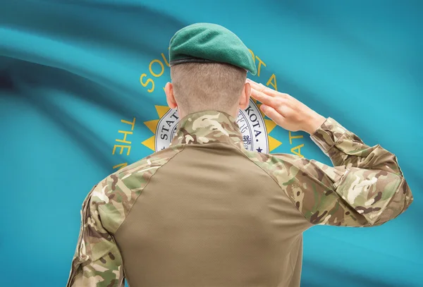 Soldier saluting to USA state flag conceptual series - South Dakota — Stock Photo, Image