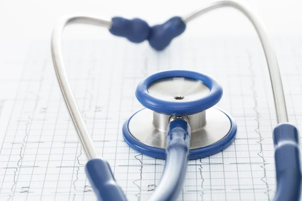 Stethoscope and ekg cardiogram chart - studio shot — Stock Photo, Image