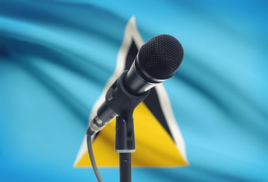 Arka plan - Saint Lucia Ulusal bayrağını ile stand mikrofon