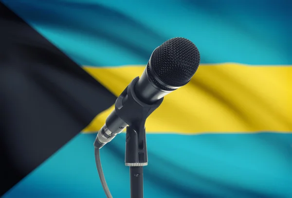 Microfone em carrinho com a bandeira nacional no plano de fundo - Bahamas — Fotografia de Stock