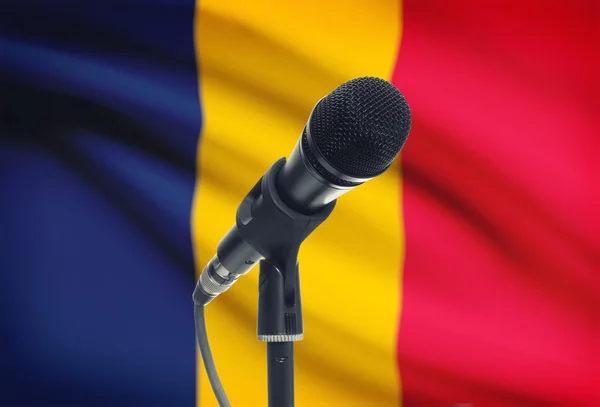 Microphone on stand with national flag on background - Chad — Stock Photo, Image