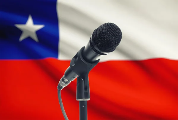 Microphone on stand with national flag on background - Chile — Stock Photo, Image