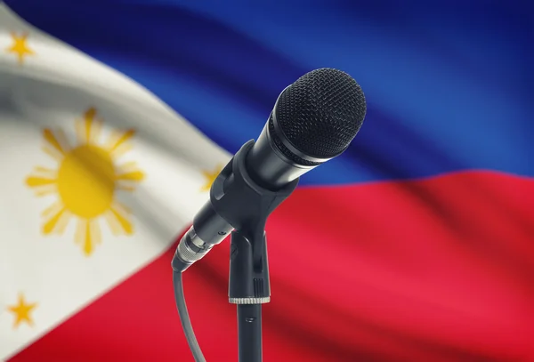 Microphone on stand with national flag on background - Philippines — Stock Photo, Image
