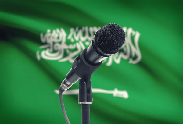 Microphone on stand with national flag on background - Saudi Arabia — Stock Photo, Image