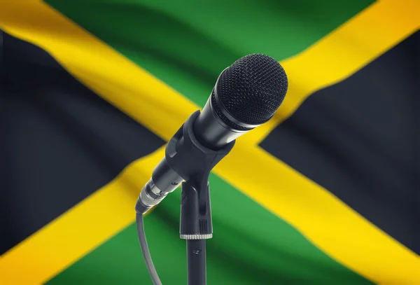 Mikrofon på stativ med flaggan på bakgrund - Jamaica — Stockfoto