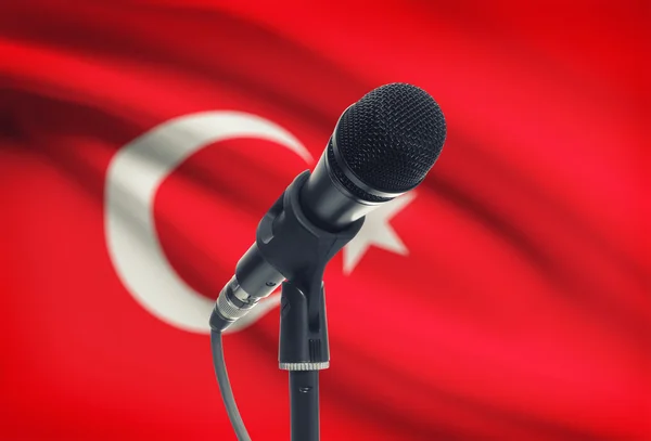 Microphone on stand with national flag on background - Turkey — Stock Photo, Image