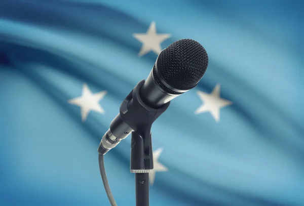 Arka plan - Mikronezya Ulusal bayrağını ile stand mikrofon — Stok fotoğraf