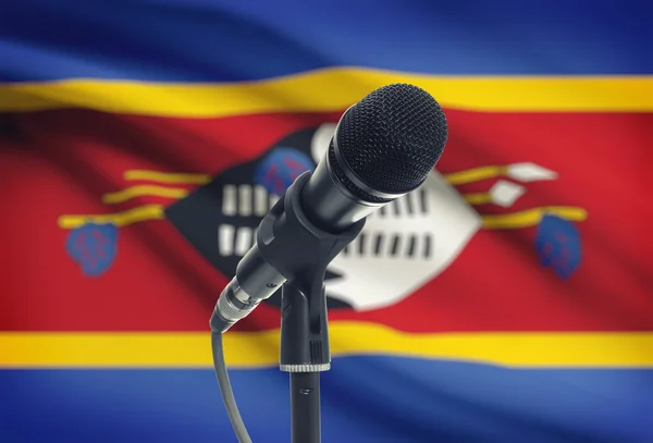 Microphone on stand with national flag on background - Swaziland — Stock Photo, Image