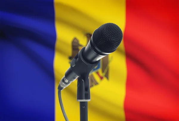Microphone on stand with national flag on background - Moldova — Stock Photo, Image