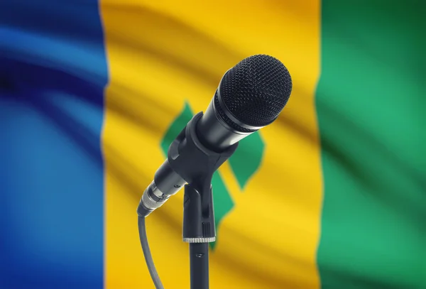 Microphone on stand with national flag on background - Saint Vincent and the Grenadines — Stock Photo, Image