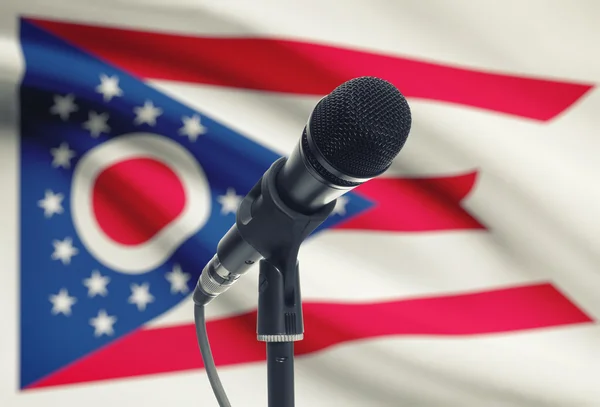 Microphone on stand with US state flag on background - Ohio — kuvapankkivalokuva