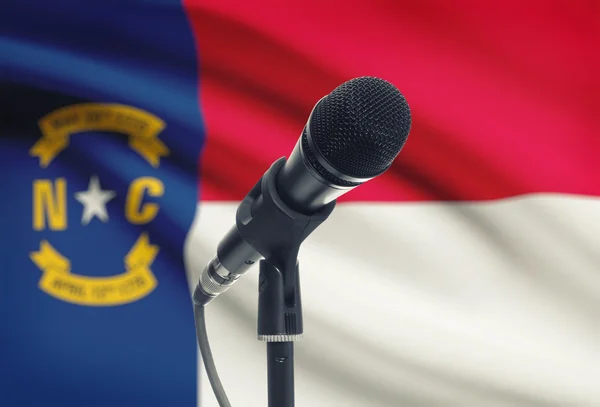 Microphone on stand with US state flag on background - North Carolina — Stock Photo, Image