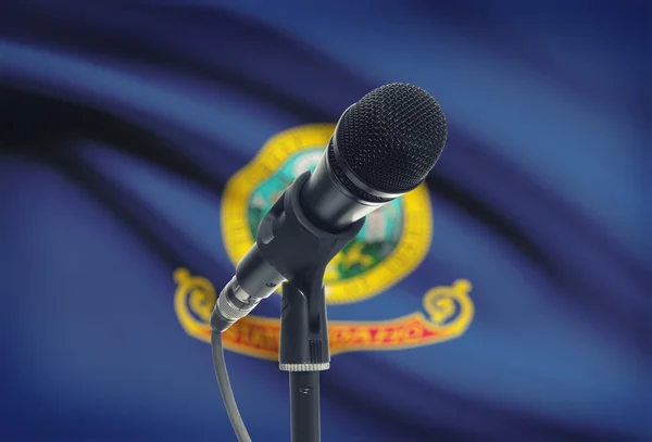 Microphone on stand with US state flag on background - Idaho — Stock Photo, Image