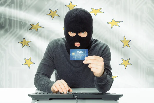 Hacker holding credit card and USA state flag on background - Rhode Island — Stock Photo, Image