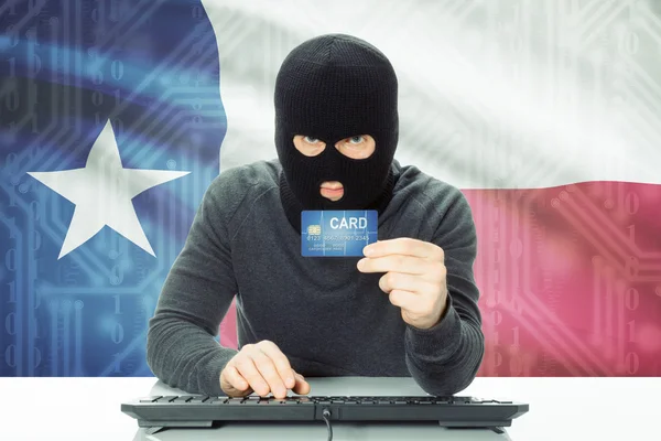 Hacker, tenant de la carte de crédit et drapeau Usa sur fond - Texas — Photo