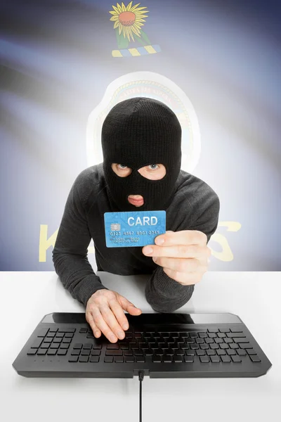 Hacker creditcard met ons bedrijf vlag op achtergrond - Kansas — Stockfoto
