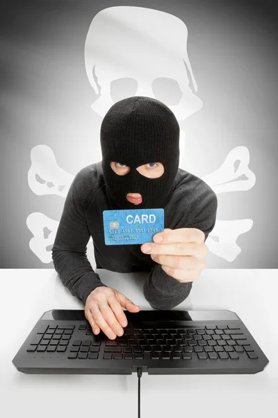 Hacker holding credit card with US state flag on background - Jolly Roger — Stockfoto