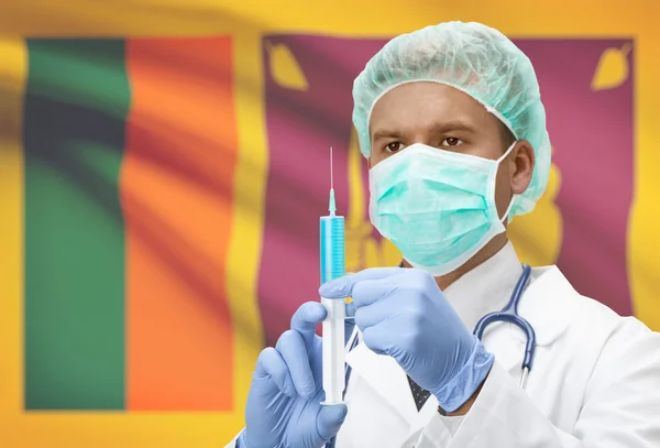 Médico com uma seringa nas mãos e bandeira na série de fundo - Sri Lanka — Fotografia de Stock