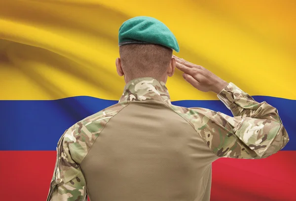 Soldat de peau foncée avec drapeau sur fond - Colombie — Photo